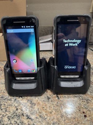 Two JANAM XT2 Android-Powered Rugged Touch Computers With Chargers.