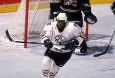 Mike Grier Edmonton Oilers skates on the ice at an NHL game - Ice Hockey Photo 4
