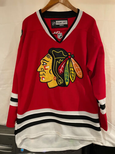CAMISETA AUTÉNTICA ROJA DE PATRICK KANE CHICAGO BLACKHAWKS REEBOK 52 CON CORREA DE LUCHA