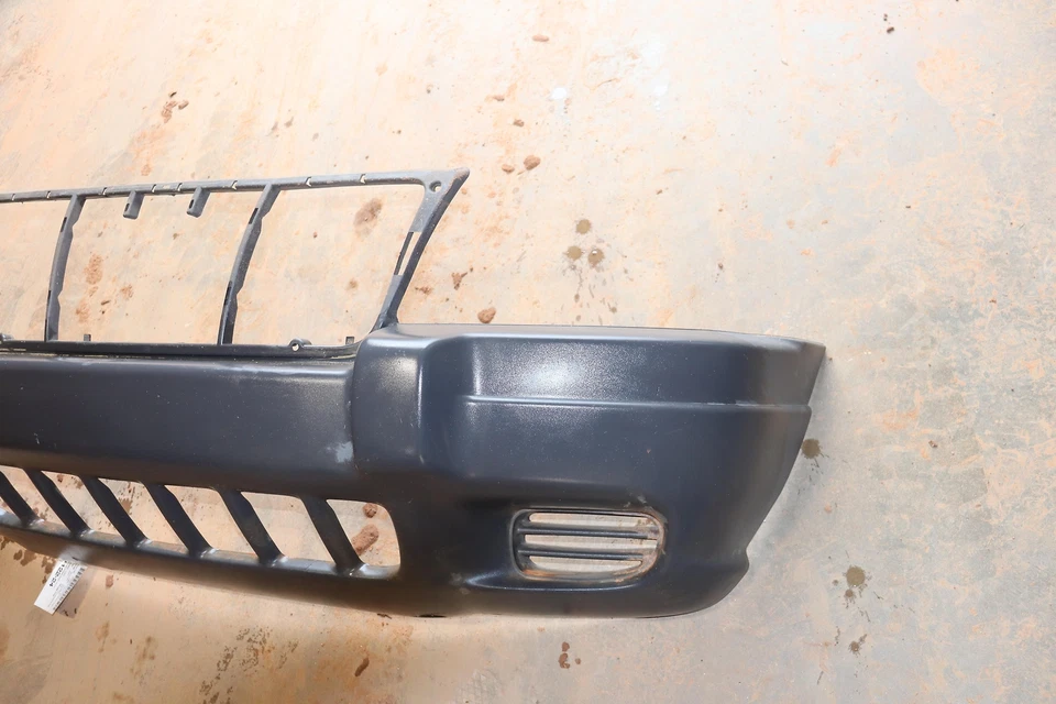 Jeep Grand Cherokee 1999-2004 parachoques delantero carcasa de plástico cubierta panel OEM Foto 2 de 4