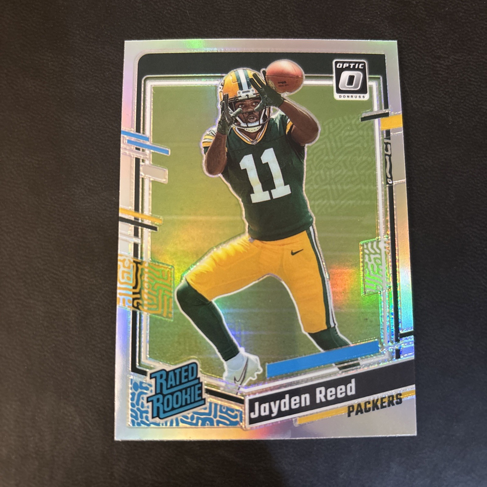 2023 Panini Donruss Optic - Rated Rookie Jayden Reed #239 Holo Prizm (RC)