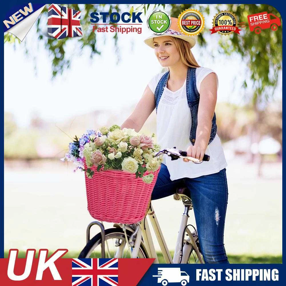 pink adult bike with basket
