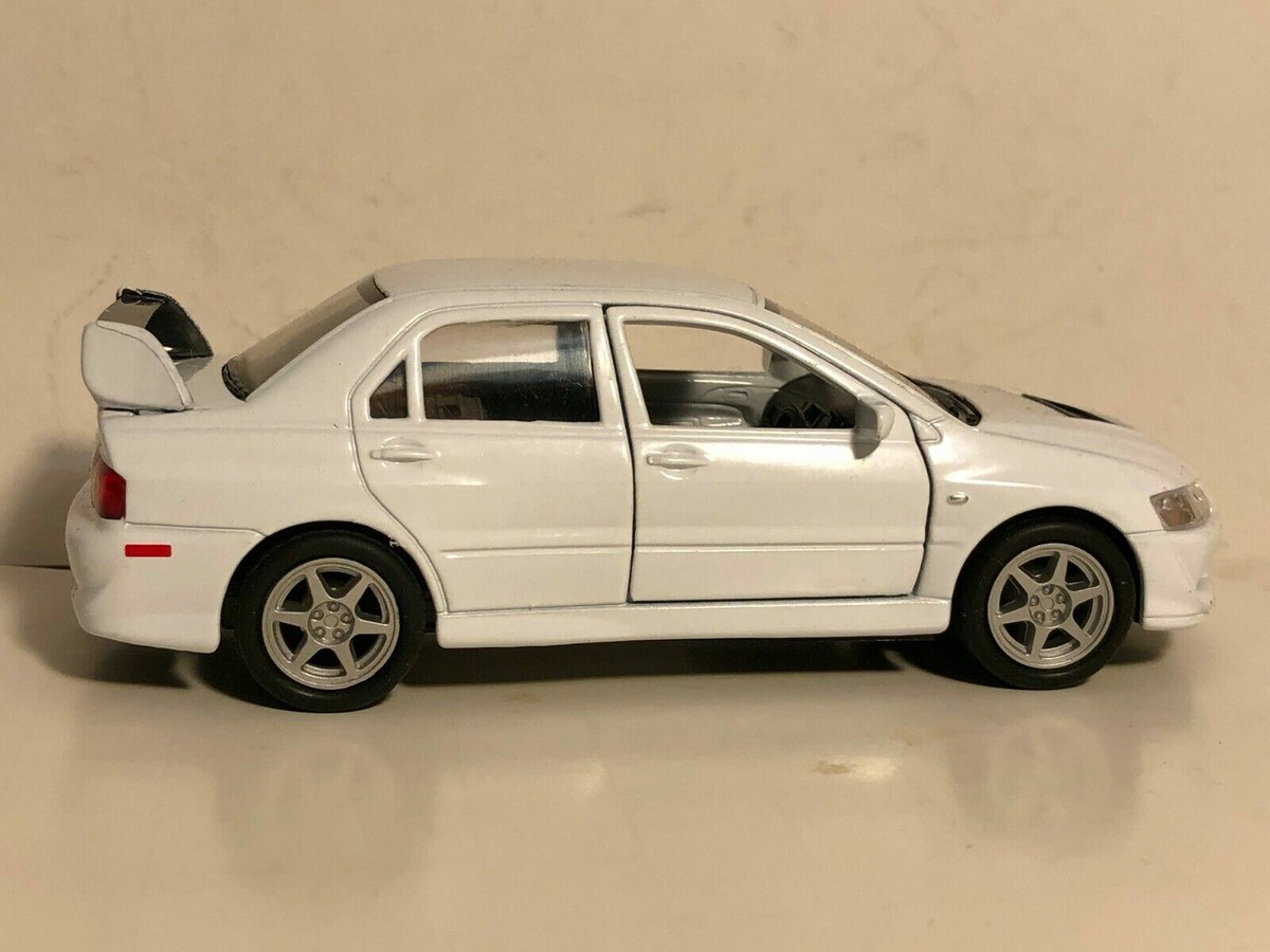 WELLY MITSUBISHI LANCER EVOLUTION XIII EVO 8 WHITE 1:32 PULL BACK