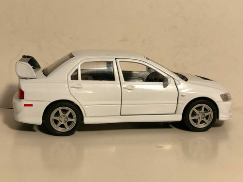 WELLY MITSUBISHI LANCER EVOLUTION XIII EVO 8 WHITE 1:32 PULL BACK NEW NO BOX - Picture 4 of 9