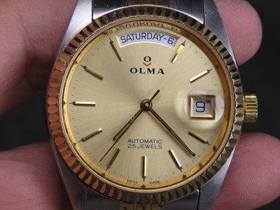 olma gold watch