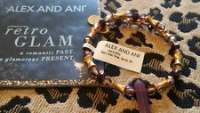 NWT ALEX AND ANI BRACELET   RETRO GLAM WRAP GARNET.   gold tone RETIRED