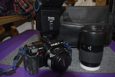Minolta Maxxum SLR 7000 w 50mm lens vivatar 2800 flash 70-210 lens, bag film cam