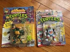VTG Ninja Turtle Lot Of 2 Rock N Roll Michaelangelo Raph Space Cadet In Boxes