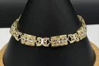 10K Gold Chiseled Designs Links Bracelet