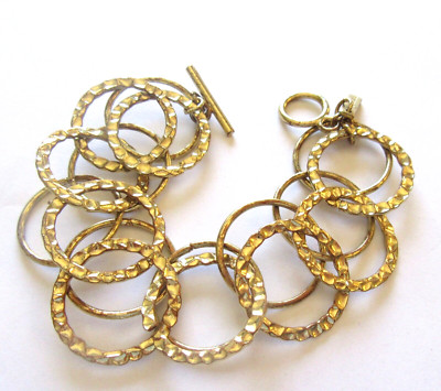 Daisy Fuentes Toggle Bracelet- gold color- circular links- 2 strands- 8''