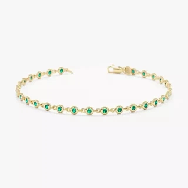 Brazalete Tenis 4Ct Corte Redondo Simulado Verde Esmeralda Acabado Oro Amarillo 14K Foto 2 de 4