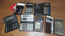 Lot of Vintage Calculators and Accessories Ca...