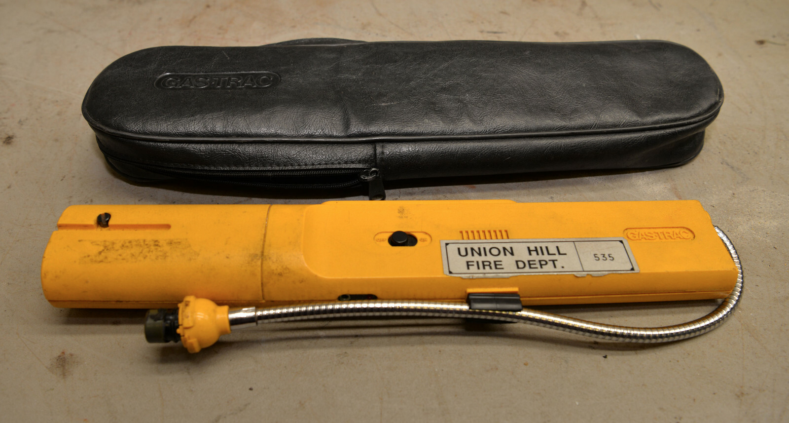 Gas Trac model NGX-6 combustion gas detector case & bracket fire fighting tool