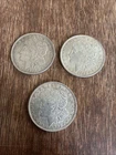 THREE NICE 1921 (D) MORGAN SILVER DOLLARS.  862