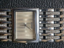 GUESS Women’s Silver Tone Analog Quartz Watch Gem-Set and Water Resistant