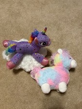 Two Gently displayed unicorn Plush Stuffed Animals Rainbow Pastel colors