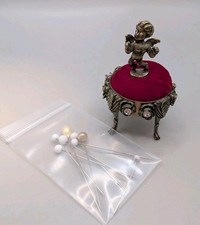 Vintage Gold Tone Brass Cherub Pin Cushion Red Velvet Rhinestone w/Glass Needles