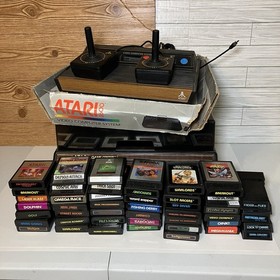 Atari 2600 Console in Box with Game Lot And Collector OEM Case Untested