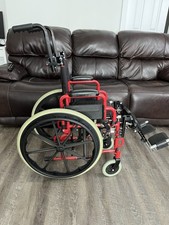 Wallaby Inspired Pediatric Foldable Wheelchair by Drive. 12" version RED