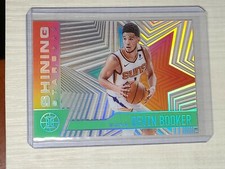 2020-21 Panini Illusions #14 Devin Booker Shining Stars Acetate Insert Card Suns
