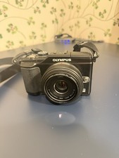 Black Olympus PEN E-PL2 Camera with Panasonic LUMIX G 20mm F/1.7 ASPH Lens