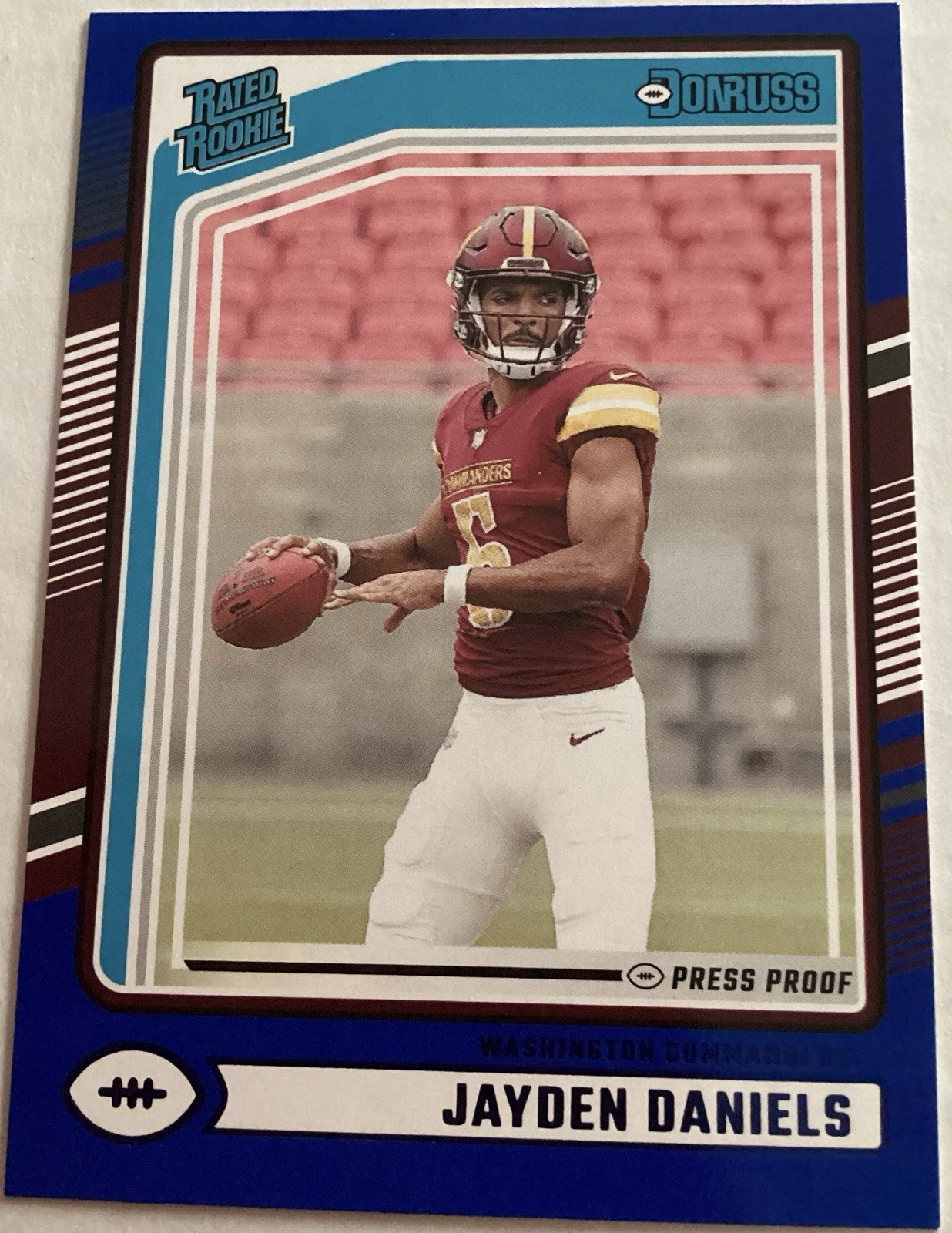 2024 Panini Donruss - Rated Rookie Jayden Daniels #389 Blue Press Proof (RC)