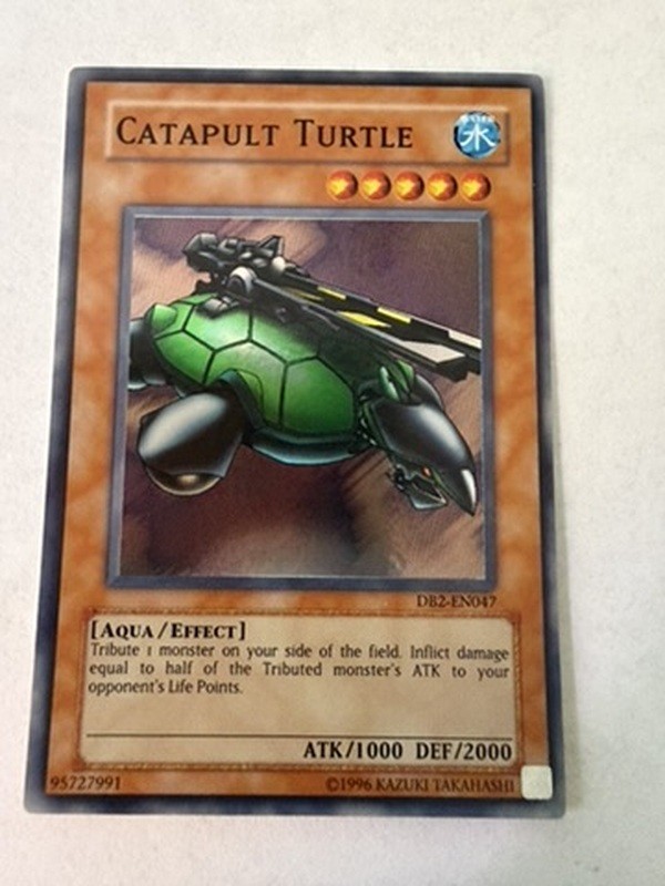 Catapult Turtle DB2-EN047 YuGiOh Dark Beginning 2 trading card — raw and PSA graded price guide