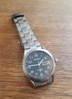 Vintage Seiko Titanium Quartz Wristwatch Black Dial Day Date 7N43 0AB0 - Used