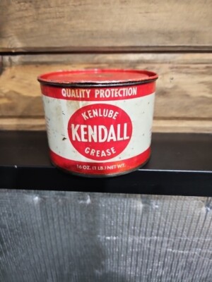 Two Kendall grease tins