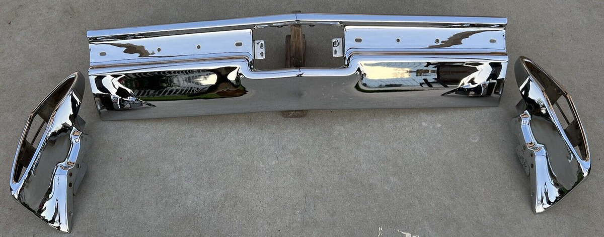 X CADILLAC NEW TRIPLE PLATED CHROME REAR BACK BUMPER CENTER 1968