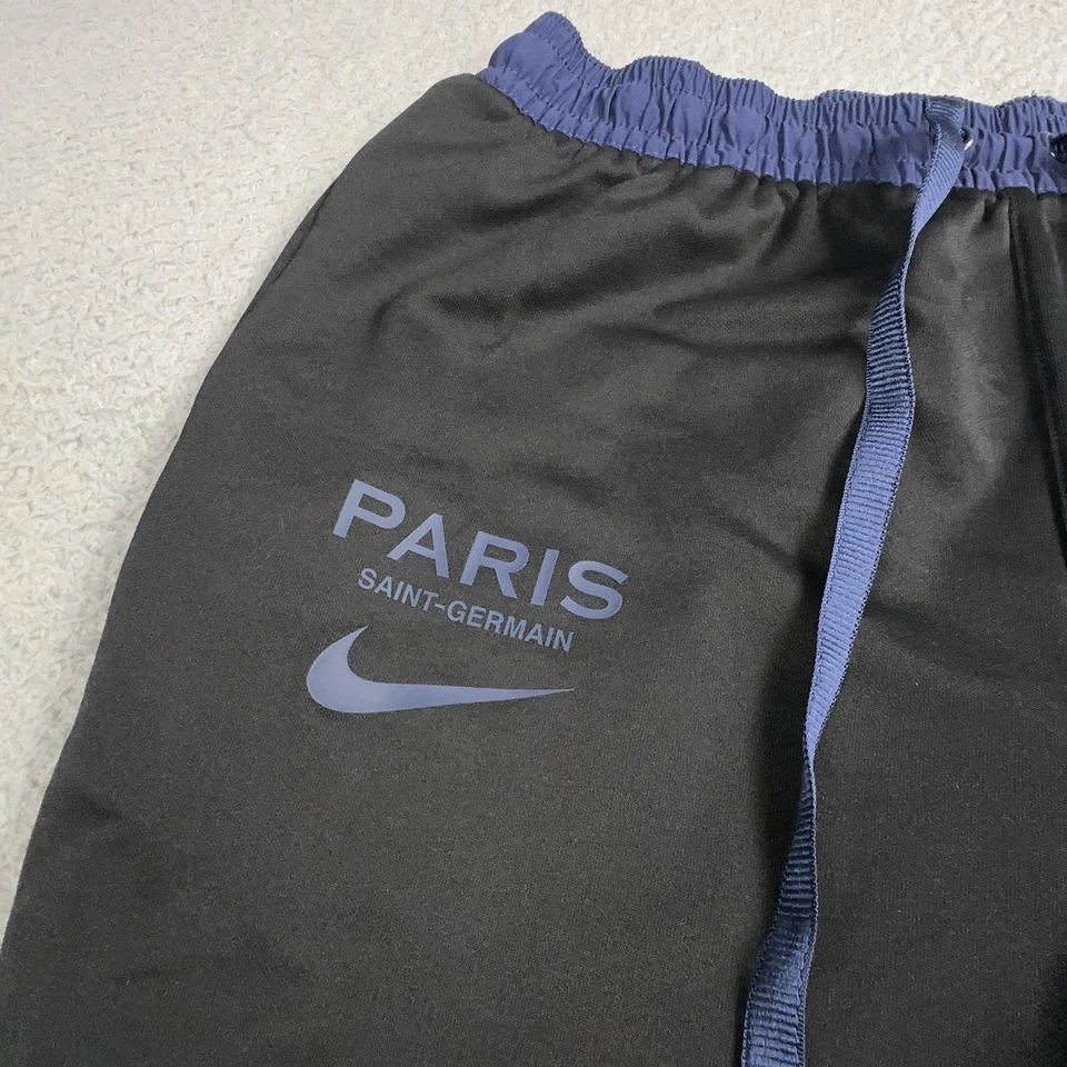 Pantalones de chándal Paris Saint-Germain para hombre grandes negros Nike fútbol PSG cremallera al tobillo Foto 3 de 4