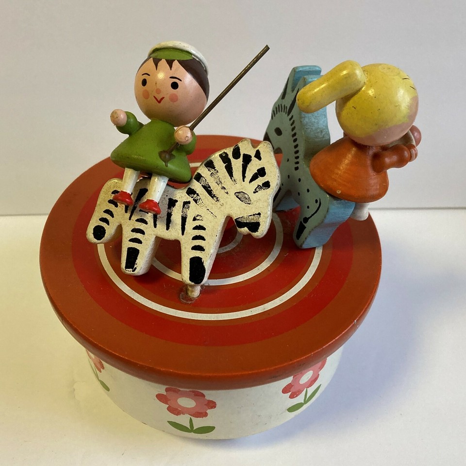 A 50s/60s carousel-themed music box with a Reuge Swiss movement — whimsy meets precision engineering.