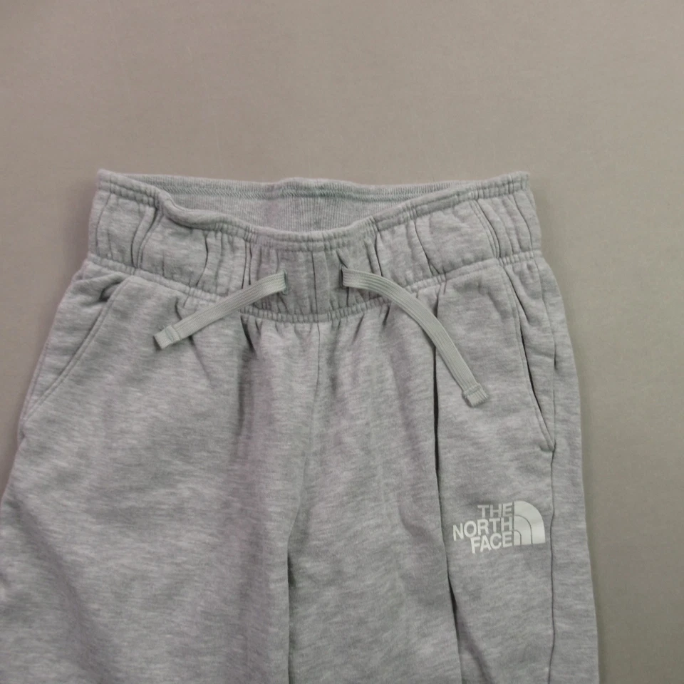 Pantalones North Face para mujer pequeños ropa deportiva gris entrenamiento ligero al aire libre Foto 2 de 4