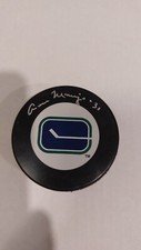 Cesare Maniago Vancouver Canucks Autographed Hockey Puck