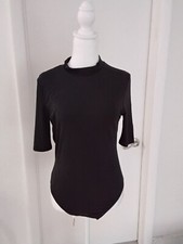 Women's open back bodysuit, size M