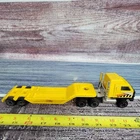 Vintage Tonka pressed steel/plastic cabover semi and lowboy trailer yellow/black