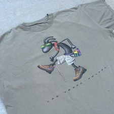 Vintage The Duck Company Joe Kokopelli Tan Beige T-shirt Las Vegas Nevada