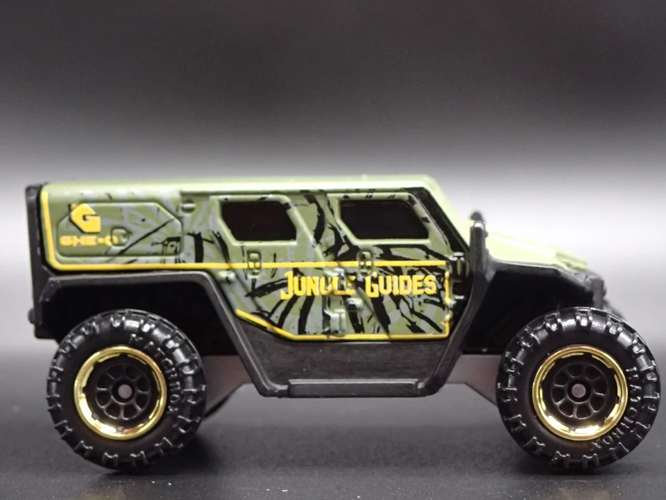 Ghe-O Salvataggio Fuoristrada SUV Giungla Guide 1/64 MB Diorama Scala Modellino - Immagine 3 di 4