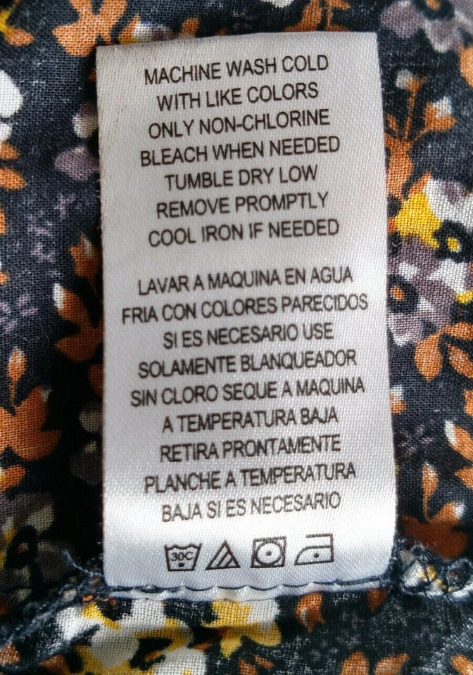 PANTALONES CORTOS MILY CYRUS MAX AZRIA talla 5 negros con flores amarillas y blancas marrón   Foto 3 de 4