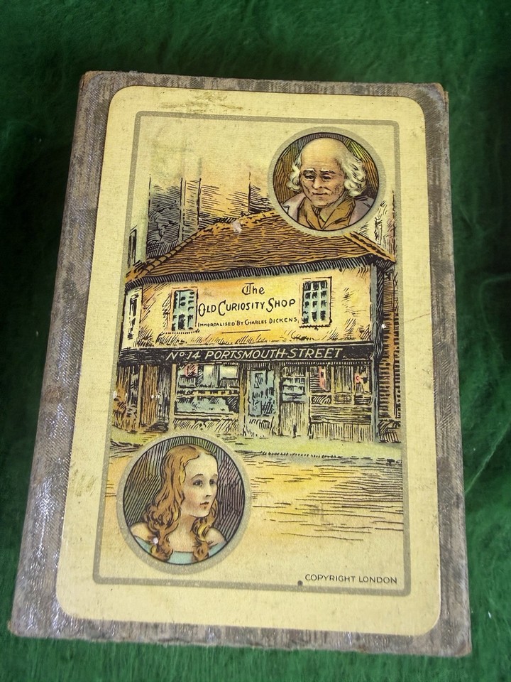 Gilt-edged Waddington playing cards themed around Dickens' Old Curiosity Shop — a conversation piece that's actually usable.