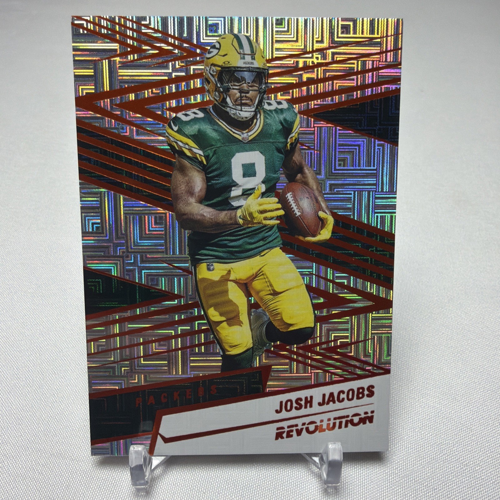 2025 Panini Revolution - Josh Jacobs #171 Orange Levels /299