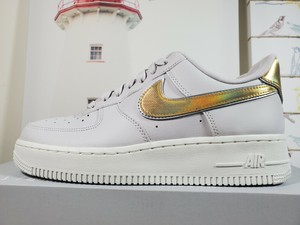 nike air force 1 low metallic gold