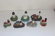 Lot of 6 Resin Lighthouses and 1 Wood Lighthouse - See Description for Details