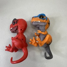 WowWee Untamed Fingerlings T-Rex Dinosaur Lot of 2 Red Ripsaw Orange Scratch
