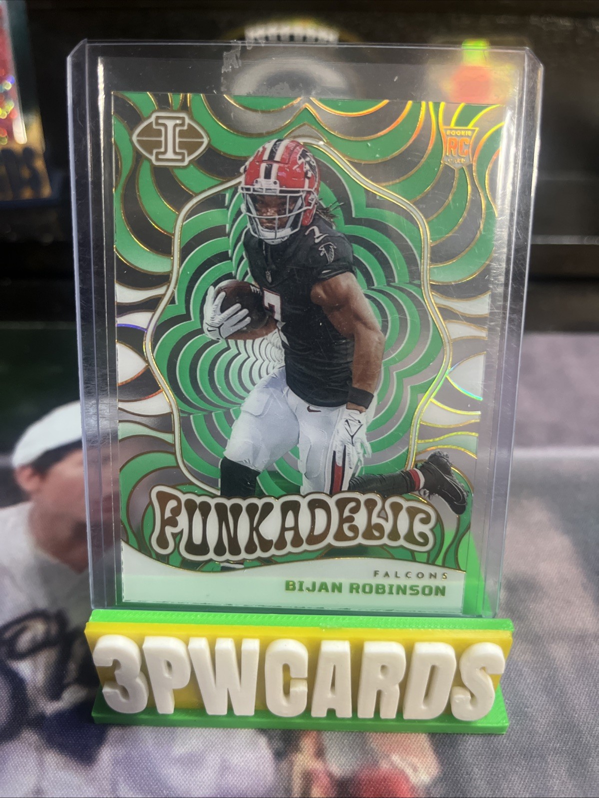 2023 Panini Illusions - Funkadelic Bijan Robinson #12 Emerald (RC)