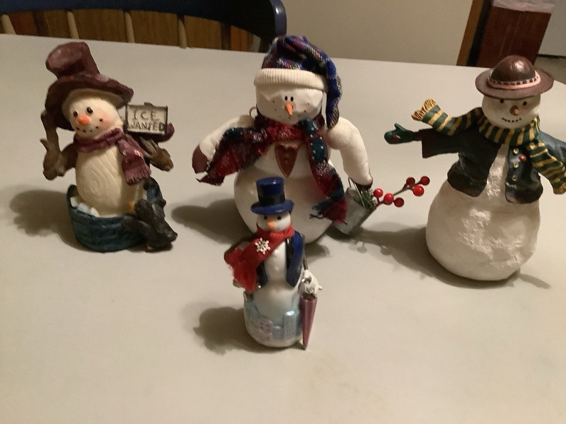 Lot Of 4 Snowmen Figurines Resin and Ceramic
