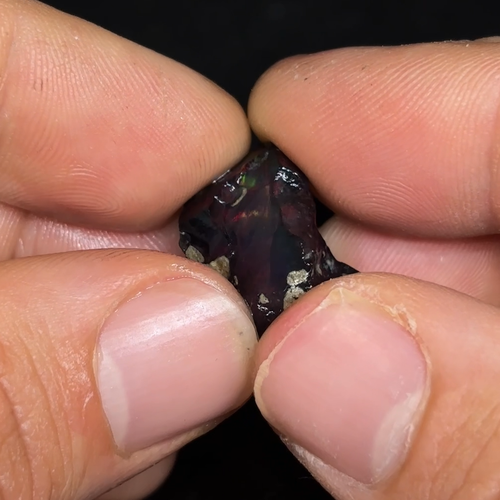 Raw Black Color Scrolling Ethiopian Opal - Video 1 of 1