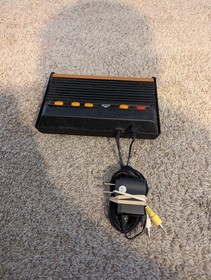 atari flashback gaming console. No controls, console and plugs only. Not tested.