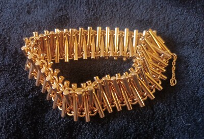 18K yellow gold multi parallel tube flexible bracelet 