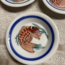 Three Miniature Saucers With Fish Motifs 3.75” Across Has Some Age To Them